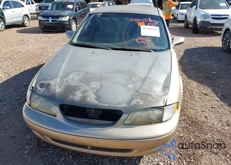 1999 Mazda 626 Es/Lx z USA, uszkodzony, nr VIN 1YVGF22C0X5869205